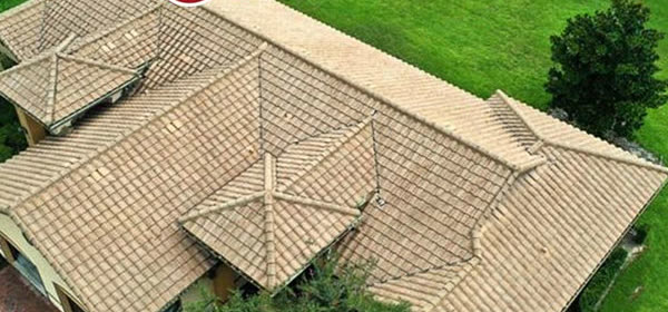 The same tile roof after soft washing, clean and even