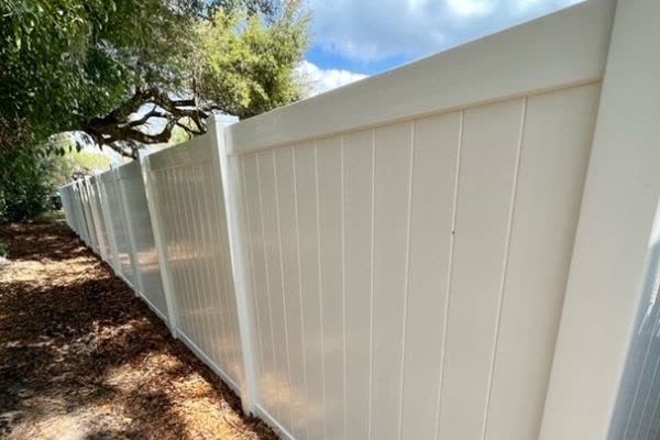 White vinyl fence after cleaning