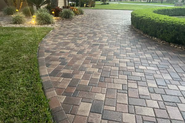 Curved paver walkway after cleaning and sealing